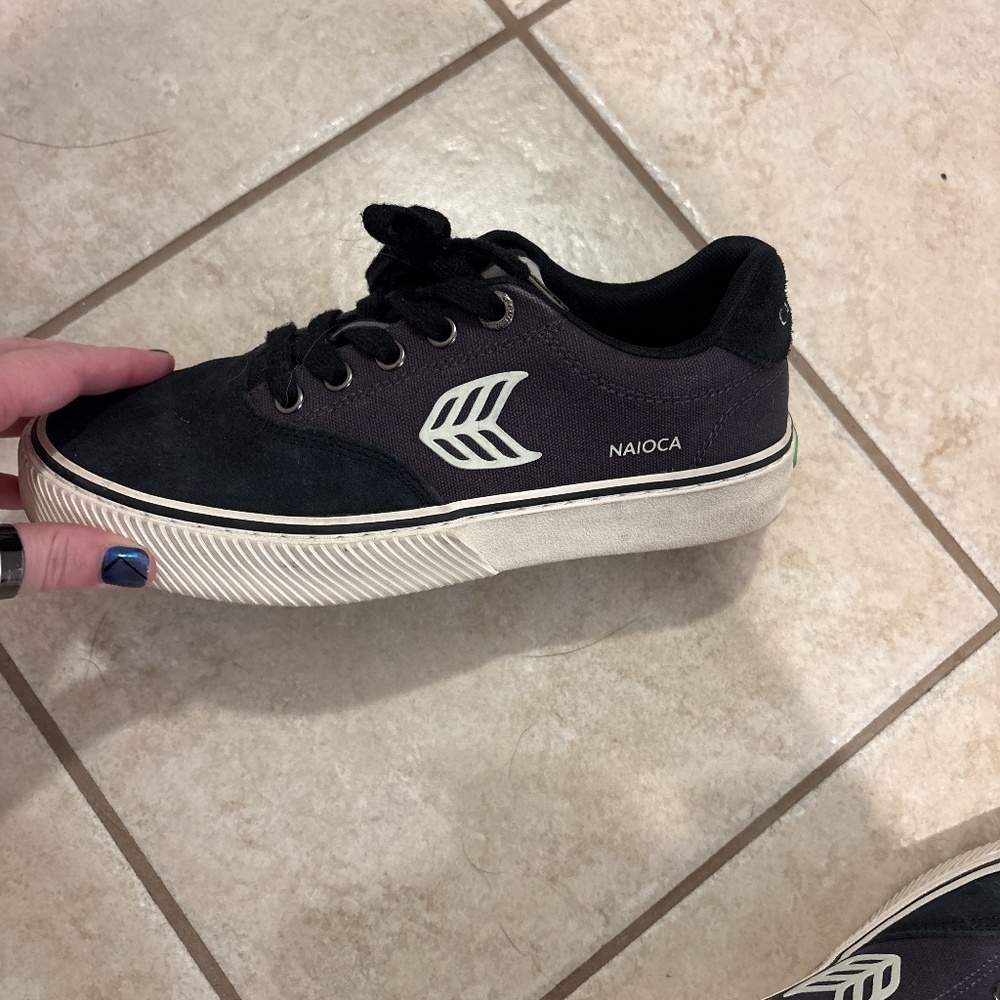 Black and white Cariuma sneakers